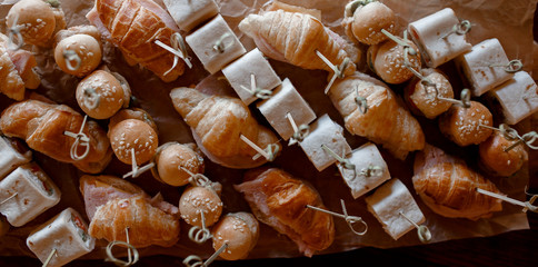 Close-up food for party: snacks, burgers, canapes. Catering service.