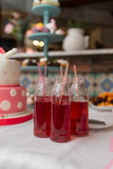 A festive sweet drink in a jar with a straw