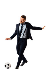 young handsome businessman manager kicking a soccer ball on white background isolated.