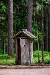 Fototapeta na wymiar details of old wooden toilet in latvian countryside