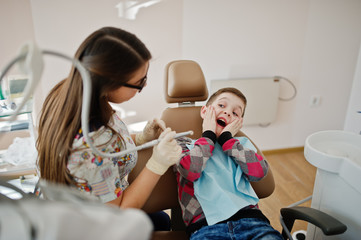 Little boy at dentist chair. Children dental.