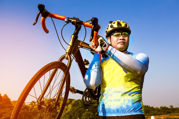 Athletes are carrying bicycles