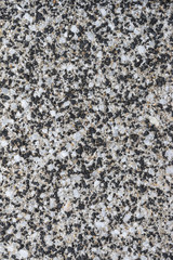 砂利の混ざったコンクリートの地面