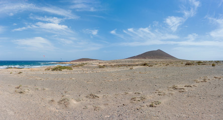 Fototapeta na wymiar Beautiful panoramic view of the Playa de Montana Roja and Red Mountain. Tenerife, Canary Islands