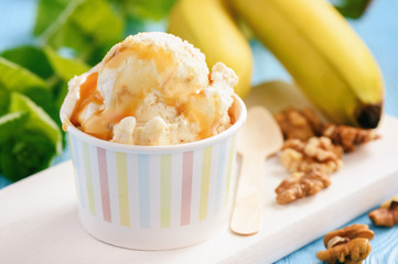 Vanilla and banana ice-cream with nuts and caramel.