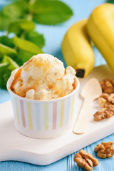 Vanilla and banana ice-cream with nuts and caramel.