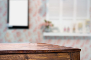 Selected focus empty brown wooden table and Coffee shop blur background with bokeh image. for your photomontage or product display