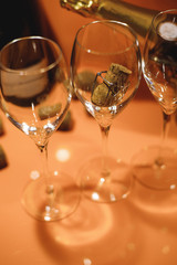 wine bottle stopper lies in a glass for champagne