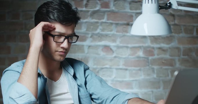 young asian student delighted in loft room 4k dollyshot