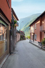 Fototapeta na wymiar holidays in Italy - Little beautiful town near the most beautiful lake in Italy, Lago di Como. Lombardy, Italy