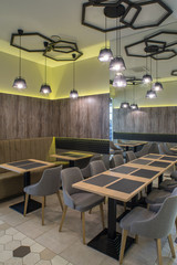 Fototapeta na wymiar Interior of restaurant. Wooden design. Modern style.