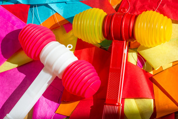 Bright colorful plastic toy hammers and bunting for celebrating the feast of St. John the Baptist...