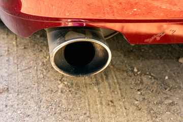 Diesel car dirty exhaust pipe.