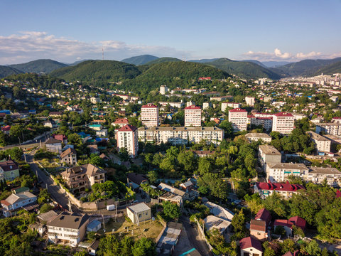 Aerial drone view on Tuapse town and hills on horizone at day time in summer