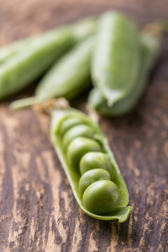 closeup of an open raw pea