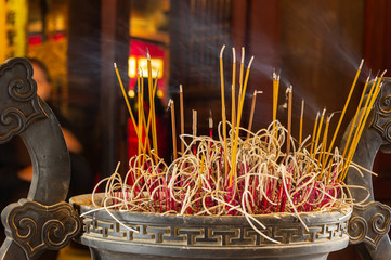 Incense at the entrance to a temple in Vietnam