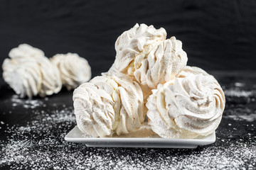 Fruit marshmallow on black background