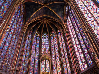 Obraz premium Rich decorated interior of the Gothic Medieval Sainte Chapelle - a royal chapel in Paris, France. June, 2018