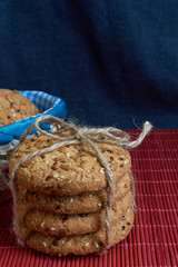 Cookies with sesame and sunflower seeds on plaid. Healthy eating