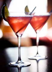 Cool cocktail cosmopolitan with a lime slice