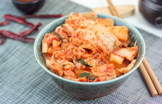 Kimchi cabbage. Korean appetizer in ceramic bowl, horizontal