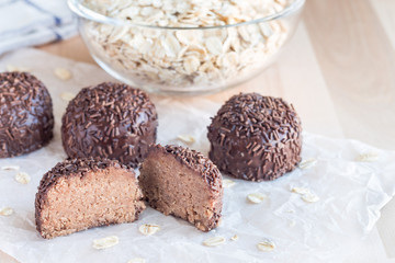 Swedish sweets Arrack balls, made from cookie crumbs, cocoa, butter and coconut wine Arrack flavour, horizontal, copy space