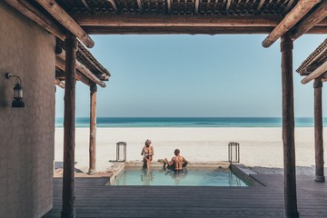 Romantic couple in a beach villa on Sir Bani Yas island