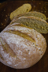 freshly baked bread on dark gray kitchen table, top view