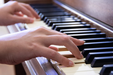 Obraz premium Hands Playing Piano