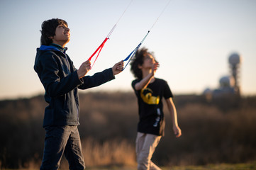 Friends play with kite
