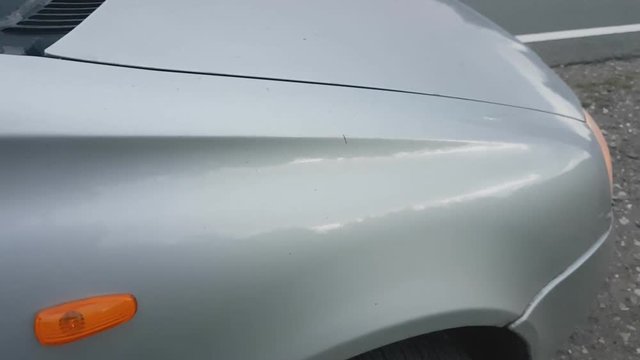 car flashing turn light yellow.