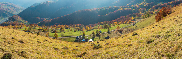 Dirty secondary road in autumn Carpathian mountain, Ukraine