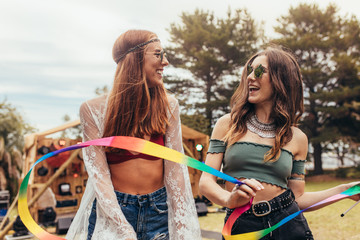 Young women enjoying at music festival.