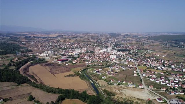Farm Land and City Seen From a Distance in the Balkan Peninsula 