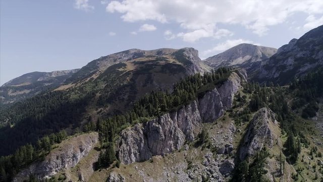 Aerial Zoom Out of Rugged Rugova Mountains of Kosovo in Daylight