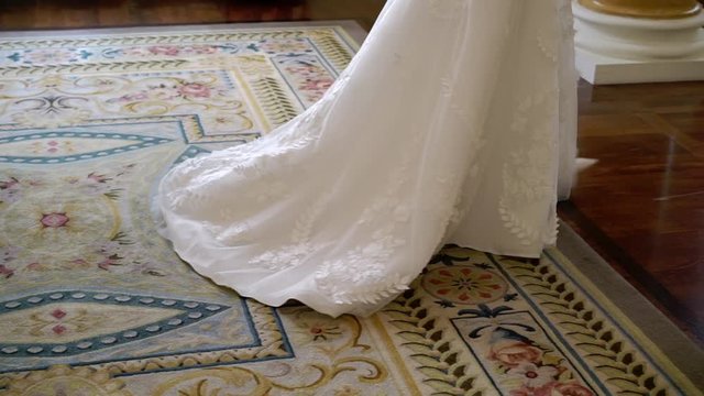 Bride walking in a palace indoors