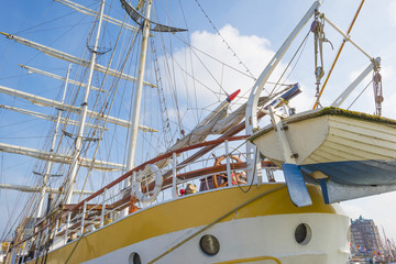 Rigging of a tall ship in a port in sunlight in spring