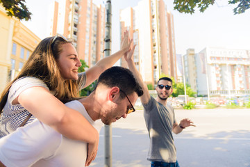 Group of friends having fun in down town
