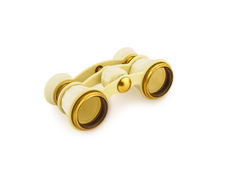 Old vintage opera glasses isolated on white background