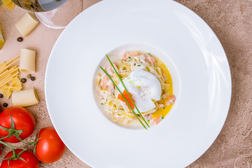 pasta with salmon and poached egg
