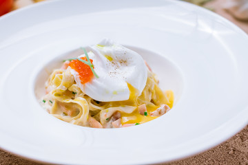 pasta with salmon and poached egg