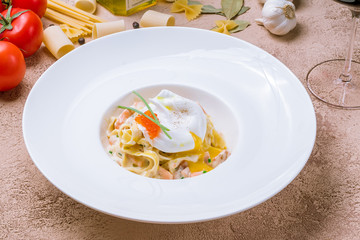 pasta with salmon and poached egg