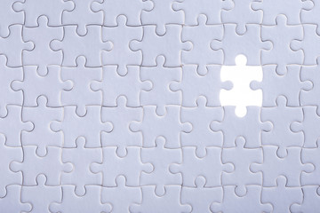 Pattern of jigsaw puzzle and one of missing hole