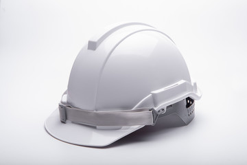 White safety helmet construction on white background.