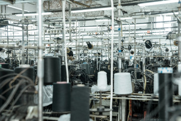 Old sewing manufacture, a factory, shop, a manufactory in work, a thread, machine tools.Old sewing manufacture, a factory, shop, a manufactory in work, a thread, machine tools.