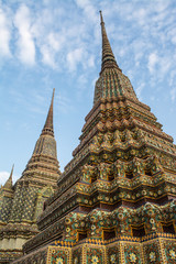 Fototapeta premium Pagoda is in Wat Pho that was named as the temple of the pagoda or chedi that are decorated with yellow glaze or glazed tiles or dark blue. 