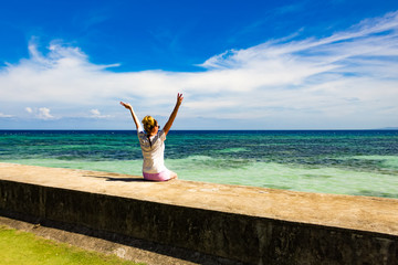 Philippines, Cebu Island, Oslo City. The girl is looking at the sea. Nice view of the sea.