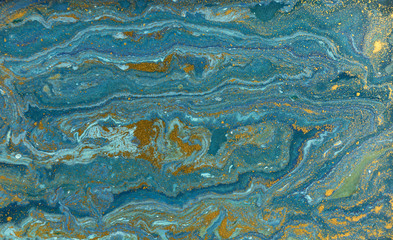 Marble abstract acrylic background. Blue marbling artwork texture. Agate ripple pattern. Gold powder.