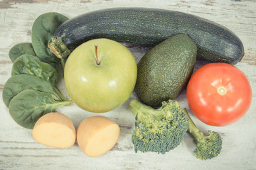 Vintage photo, Fruits and vegetables containing vitamin K, minerals and dietary fiber, healthy nutrition concept