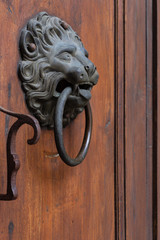 church brown wooden door with handles details